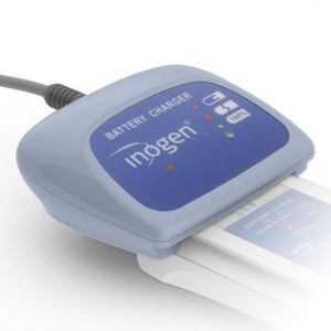 Image of the Inogen One G4 External Battery Charger with Power Supply. The charger is compact and lightweight, designed to charge both single and double batteries efficiently. It includes the charger unit, power supply, and AC input cord, making it a convenient accessory for users of the Inogen One G4 Portable Oxygen Concentrator.